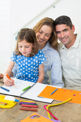 Happy family coloring at home