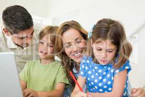 Family spending leisure time at home