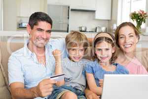 Happy family shopping online