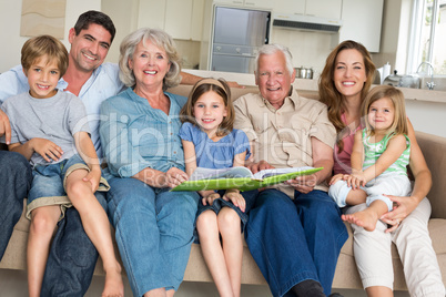 Family with storybook at home