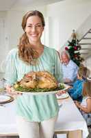 Happy mother with Christmas meal