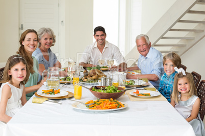 Family having meal together at dining table
