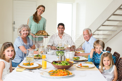 Family having meal at dining table