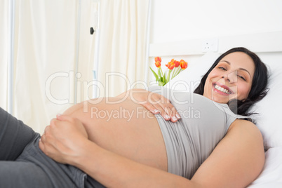 Portrait of happy pregnant woman