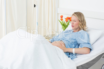 Woman suffering from labor pains