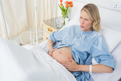 Expectant woman suffering from labor pains