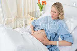 Expectant woman suffering from labor pains