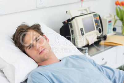 Patient relaxing in hospital bed