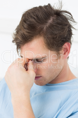 Male patient suffering from headache