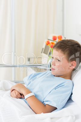 Boy with thermometer in mouth