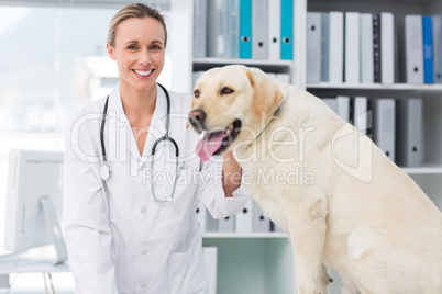Confident female vet with dog