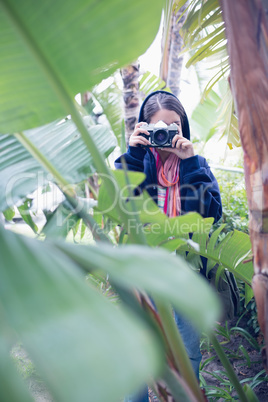 Attractive brunette taking a picture