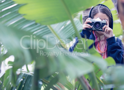 Young brunette taking a picture