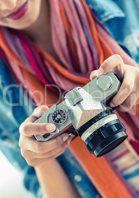 Young smiling woman looking at her camera