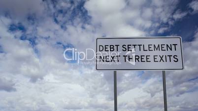 Debt Settlement Sign Clouds Timelapse