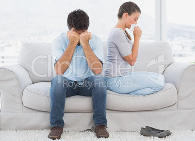 Couple on the couch after an argument