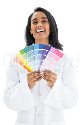 Portrait of a woman with paint samples