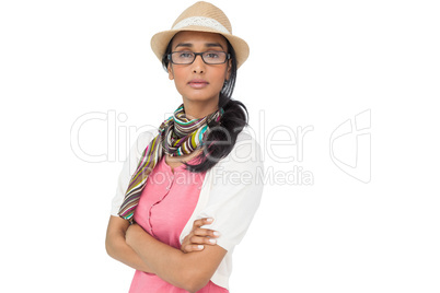 Portrait of a cool young woman with arms crossed