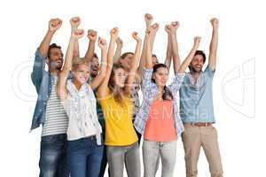 Group of casual happy young people raising hands