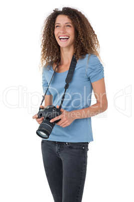 Portrait of a cheerful female photographer