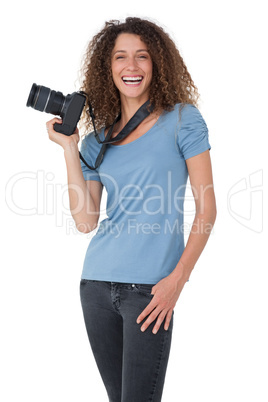 Portrait of a cheerful female photographer