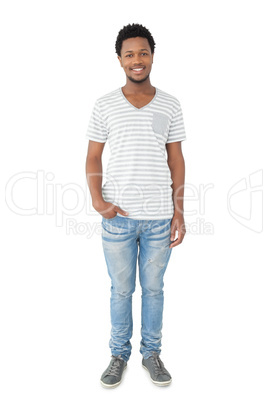 Full length portrait of a smiling young man