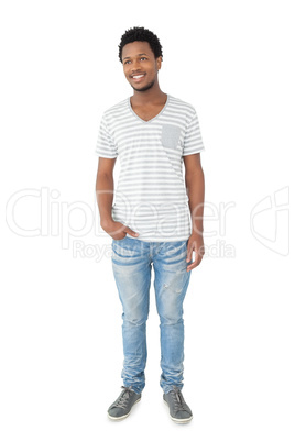 Full length portrait of a smiling young man