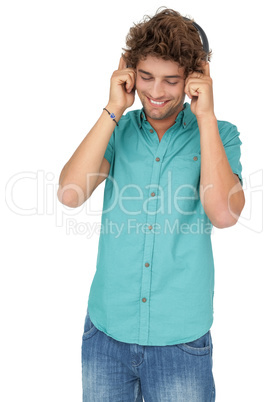 Portrait of a young man enjoying music