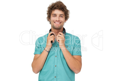 Portrait of a young man with headphones smiling