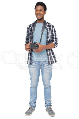 Full length of a happy male photographer