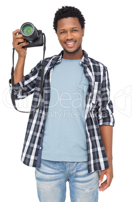 Portrait of a happy male photographer