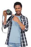 Portrait of a happy man pointing at his camera