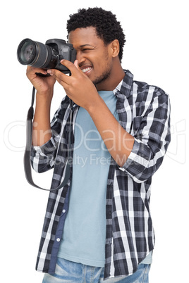 Young man with camera