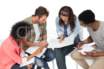 Group of casual young people in meeting