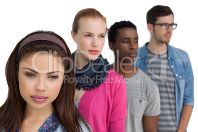 Portrait of four serious young friends