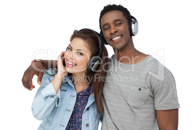 Portrait of a young couple enjoying music