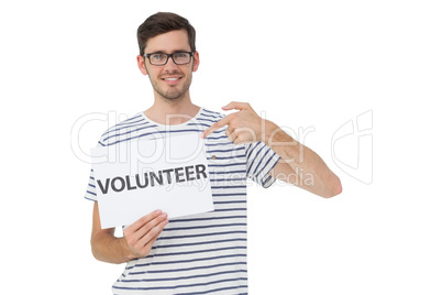 Happy man pointing at donation welcome note