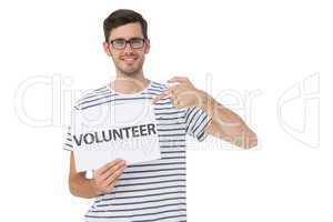 Happy man pointing at donation welcome note