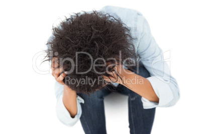 Top view of a sad young woman
