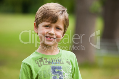 Portrait of a smiling young boy at park
