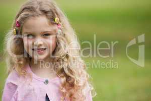 Close-up portrait of smiling girl at park