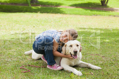 Portrait of a girl with pet dog at park