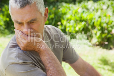 Thoughtful mature man at the park