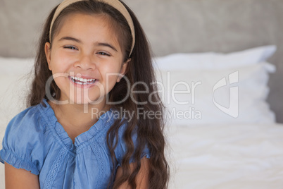 Close-up portrait of a happy young girl