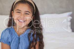 Close-up portrait of a happy young girl