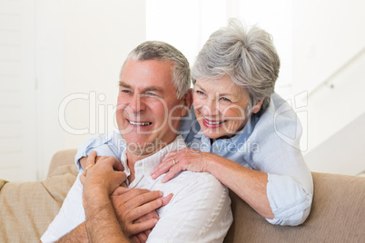 Retired couple embracing