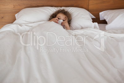 Portrait of a girl resting in bed