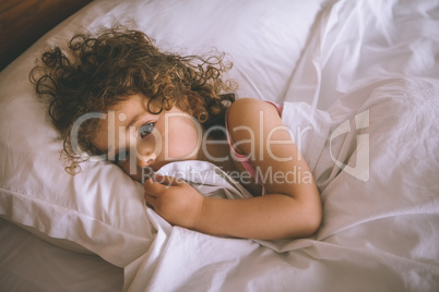 Portrait of a young girl resting in bed Portrait of a young girl resting in bed