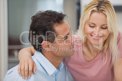 Close-up of a loving man looking at happy woman