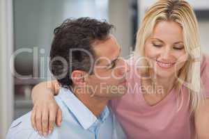 Close-up of a loving man looking at happy woman